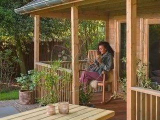 Teak schommelstoel
